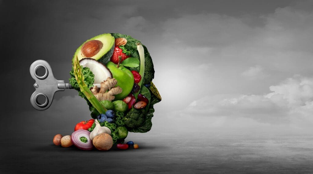 A picture of the human head made of food with a key in the back. Depicting how diet is a function of psychiatry. 