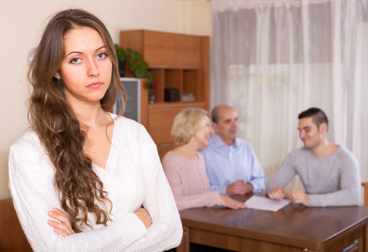 Sad girl staying against united family expectations on having no career