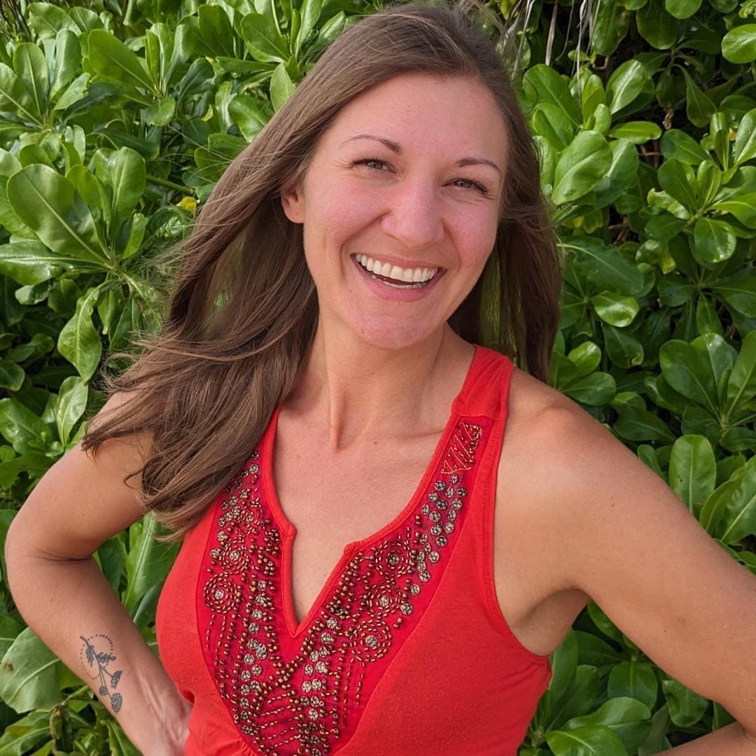 Photo of Krista Lindquist: intuitive guide, yoga life coach, all-natural crafter, and best-selling author on a mission to help others in their healing journey. 