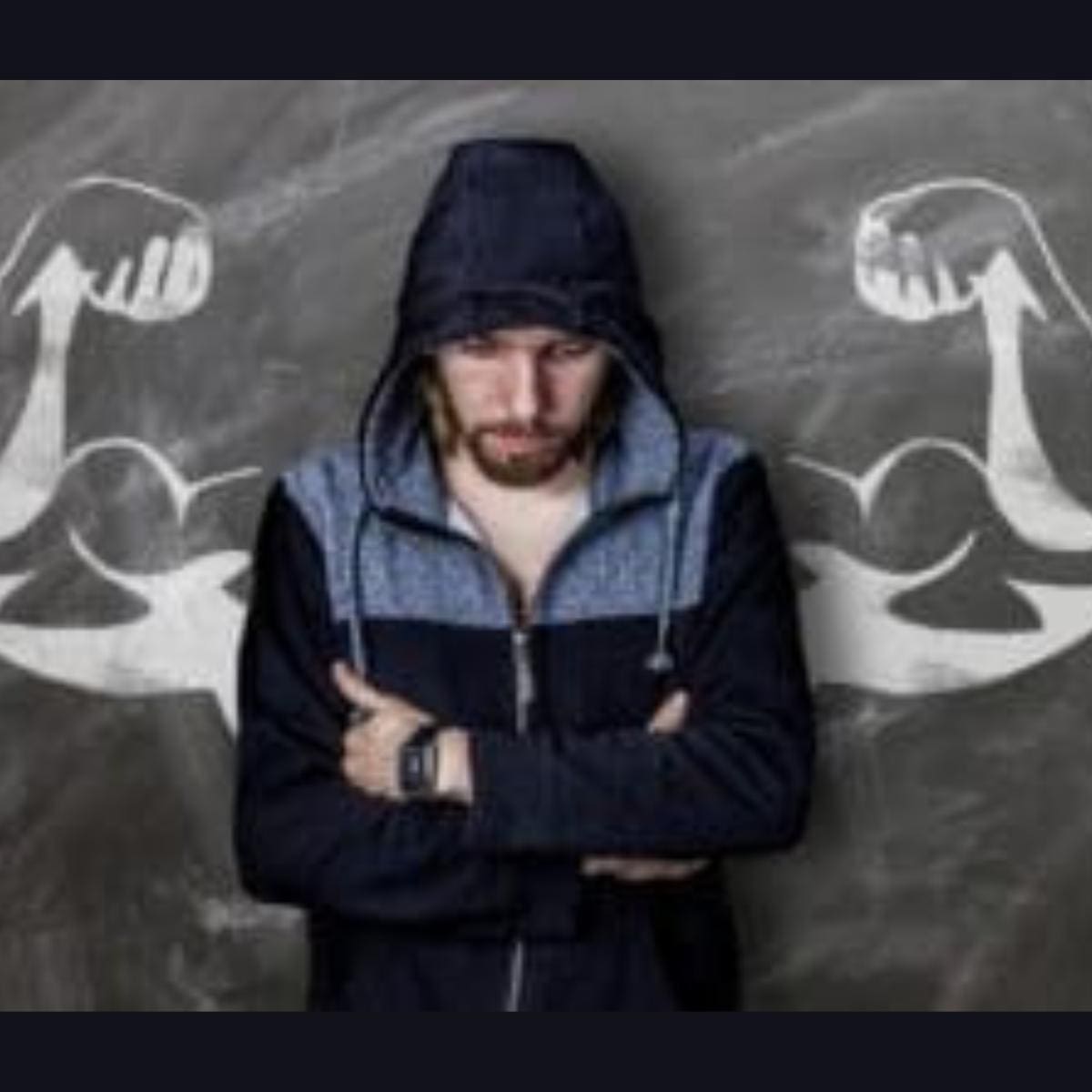 Man feeling sad and defeated with fake strong arms drawn behind him in chalk