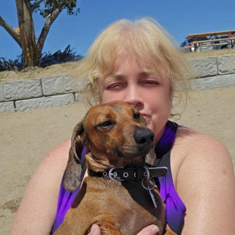 Another photo of Patty and her dog Little Man.