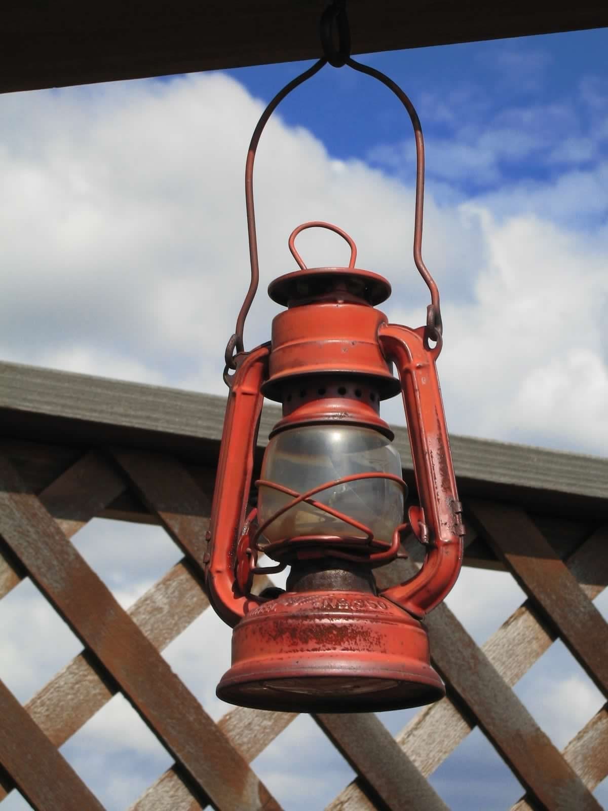 An old lantern hanging from the porch.