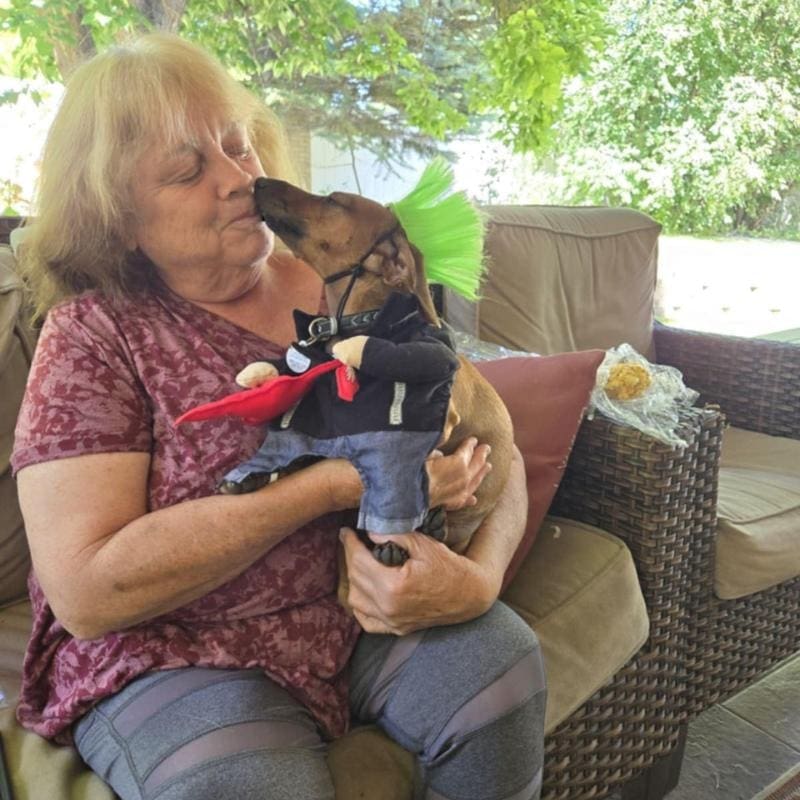 A photo of the author and her dog Little Man.