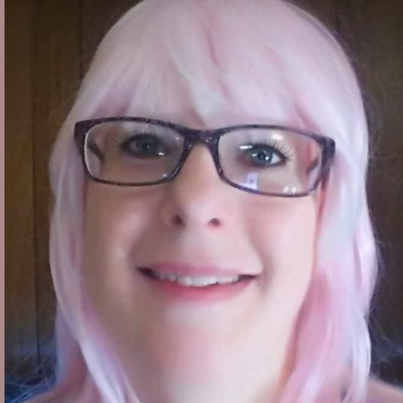 An image of Michelle in a pink wig after losing all her hair to Alopecia.