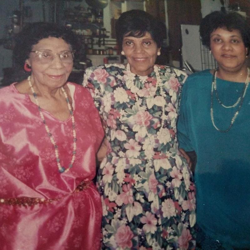 Marion Josephine Gilmore Harvey is on the left in the red. Carol Penn's godmother Ruth Adams Glover is in the center/ she is the mother of Stephanie Robinson, EeD and Aunt Ruth’s younger daughter Judith Glover.